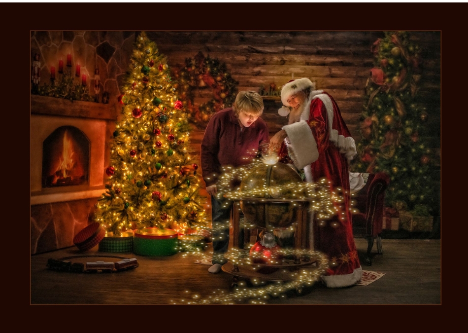 boy looking at globe with Santa by Longieliere Photography
