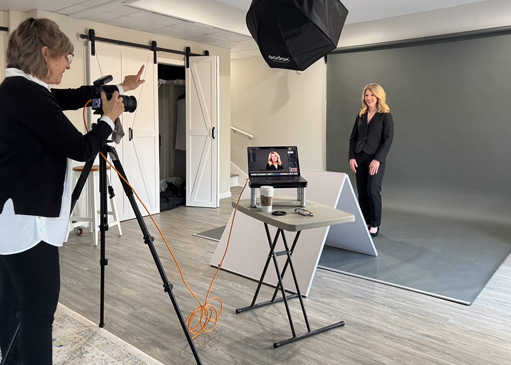 Anne Say Photography working with a headshot client in studio