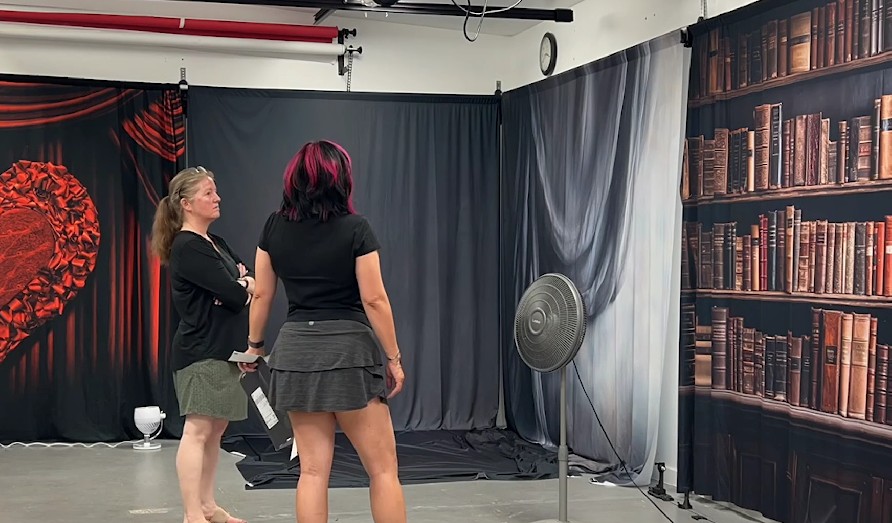 Photographer switching backdrops quickly between sessions
