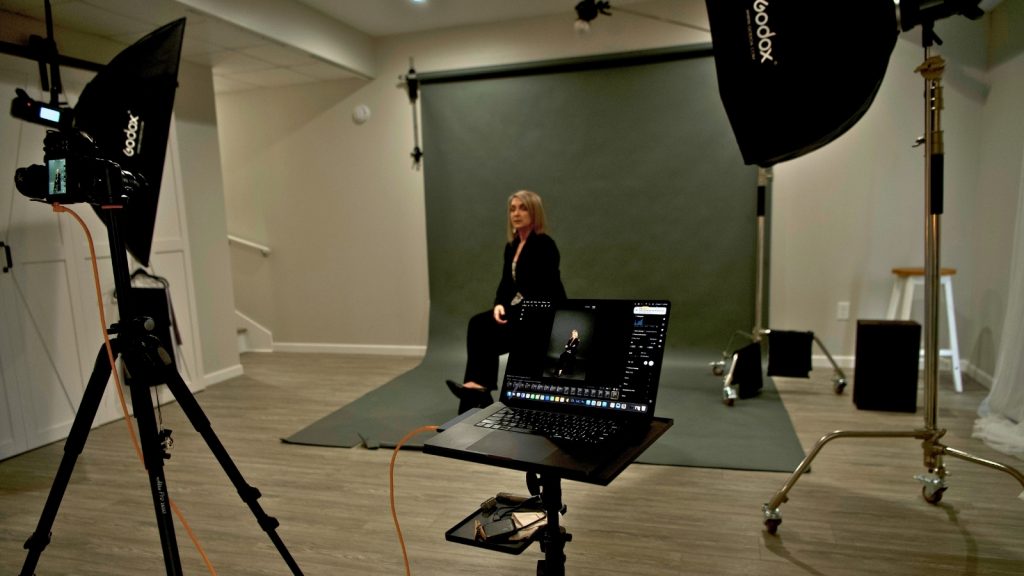 Organized photography studio with clean backdrops and open floor space