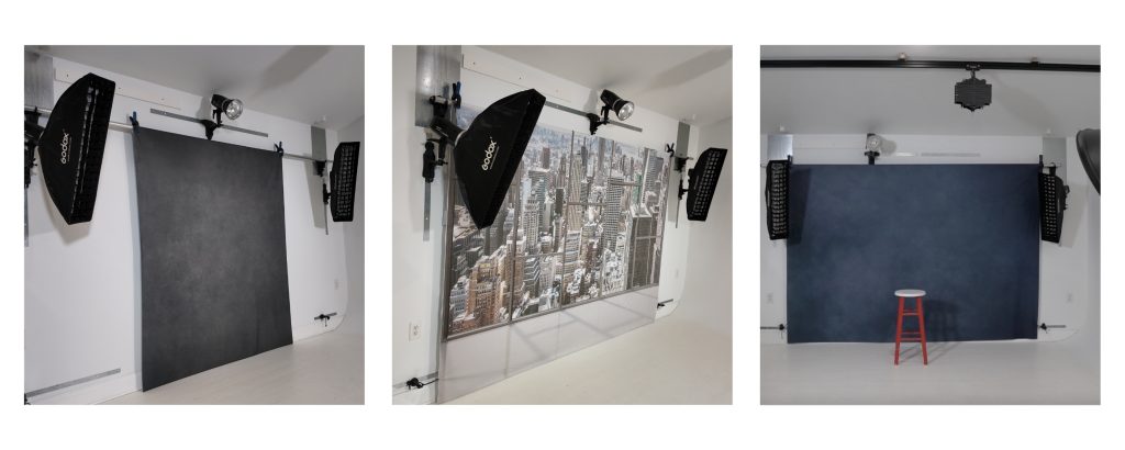 A clean, organized studio wall with multiple backdrops neatly hung on a TogDrop system.