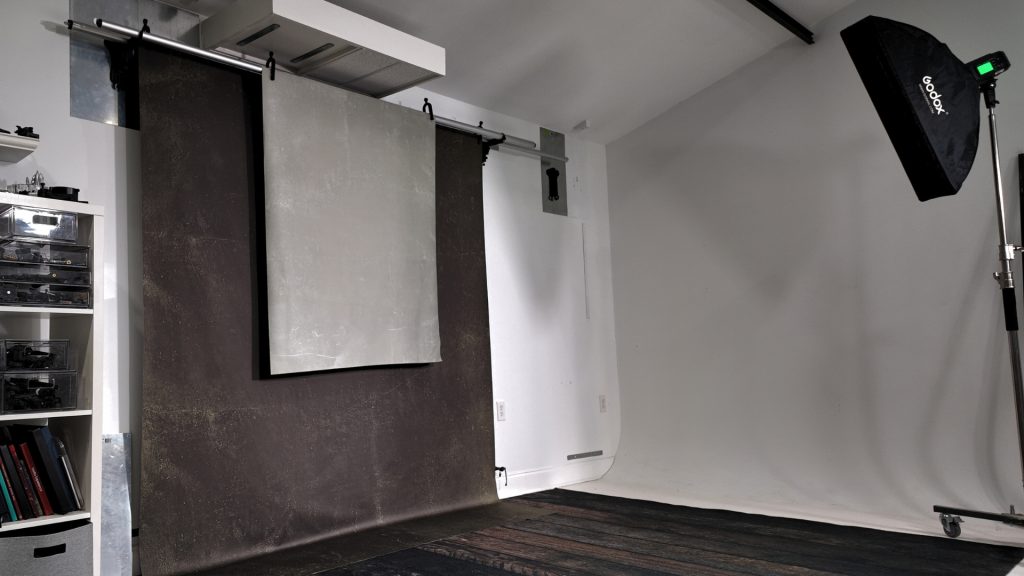 layered backdrop setup using togdrop system, double backdrop configuration, studio ready for session, professional studio environment