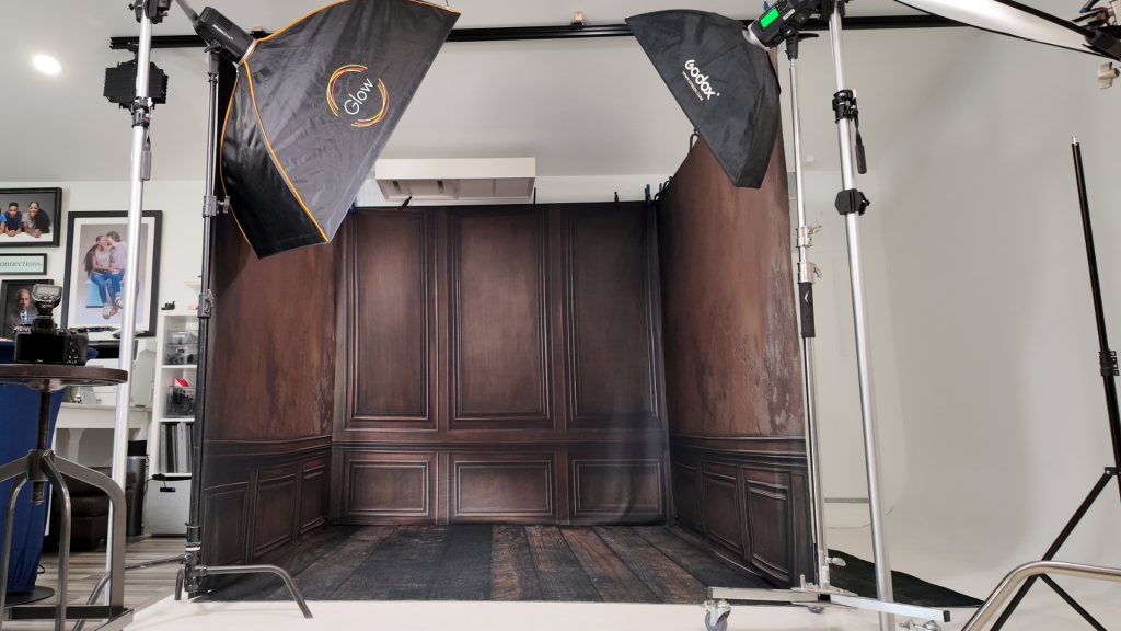 three sided backdrop wall setup in small photography studio for multiple scene options