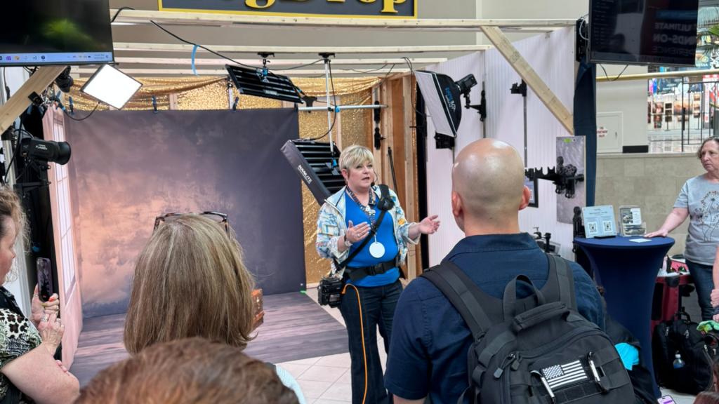 judy reinford teaching photographers at shutterfest togdrop booth